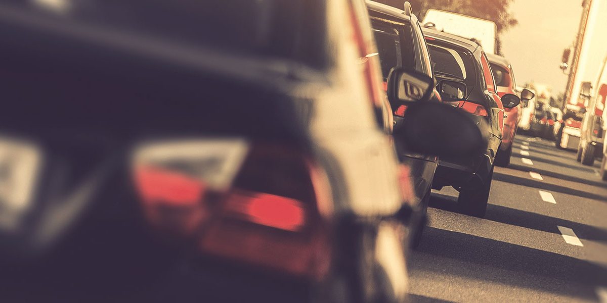 cars queue on highway