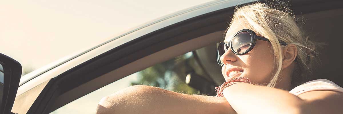 girl looking outside from car window