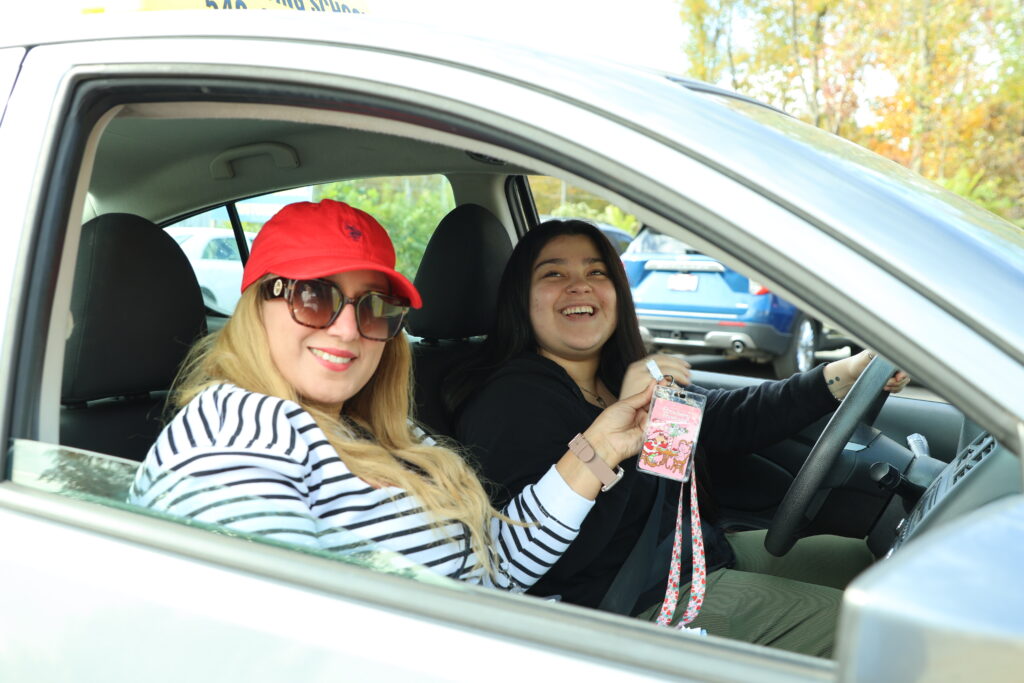 Happy student driver in training with 2020 Driving School