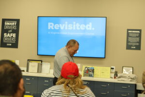 Instructor leading Virginia driver improvement class at 2020 Driving School